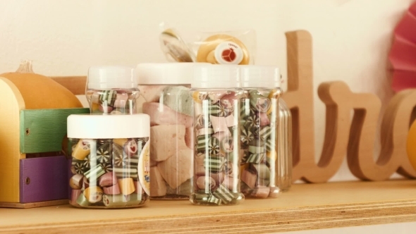 The Happy Girl Chooses Candies alt