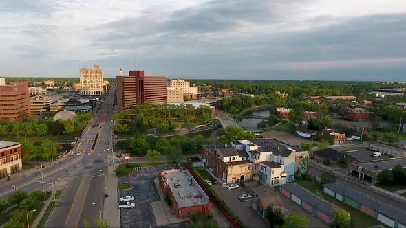 The Flint river cuts through the heart of downtown Flint, Michigan as captured from above by drone.