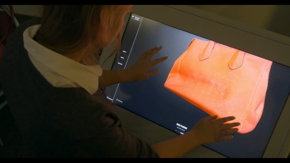 3D Model Of a Bag On Touchscreen Monitor