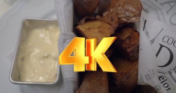 Eating Baked Potatoes With Cream Sauce alt