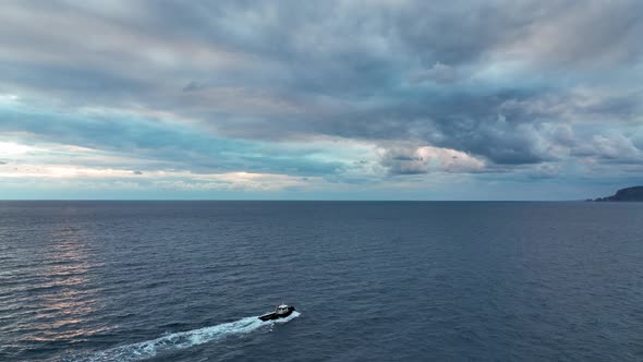 I Follow the Boat in the Open Sea Aerial View 4 k Turkey Alanya