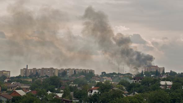 City On Fire After Artillery Strike