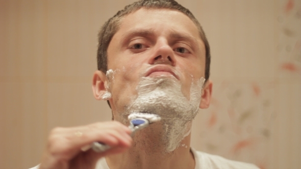 A Man Shaves