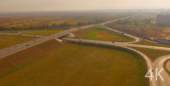 Cars at complex interchange and highway