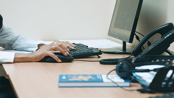 Woman Designing Draft Using Computer