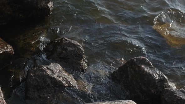 Sea Waves Beating Against The Rocks