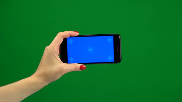 Phone Screen Is Blue Chroma Key. Green Screen