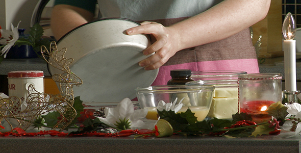 Woman Uses Butter to Grease a Cake Tin