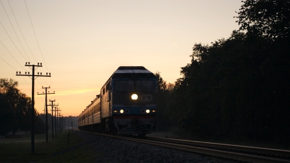 Train Passing By In The Countryside