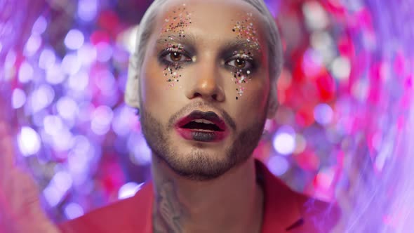 Portrait of Man with Dramatic Make-Up Acting for Camera