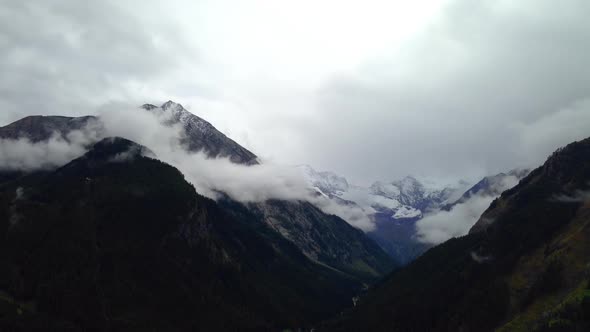 Clouds Float Over the Alps