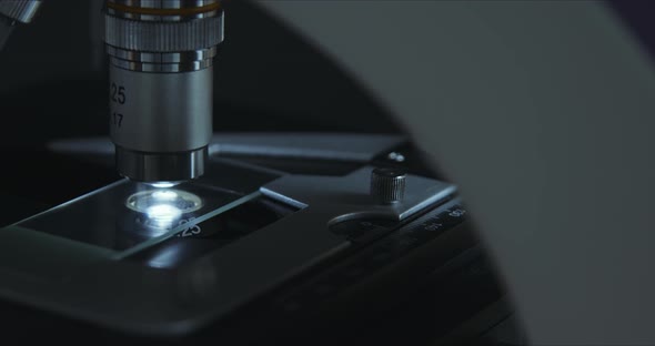Crop Closeup Shot of Microscope in the Laboratory, Scientist Is Conducting Study Examines