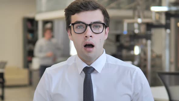 Shocked Businessman Wondering