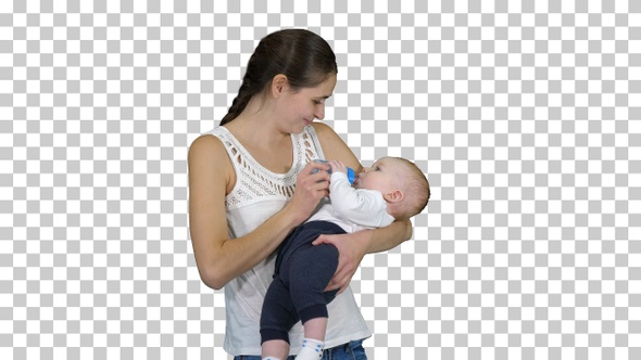 Mother Gives Baby to Drink from Bottle, Alpha Channel