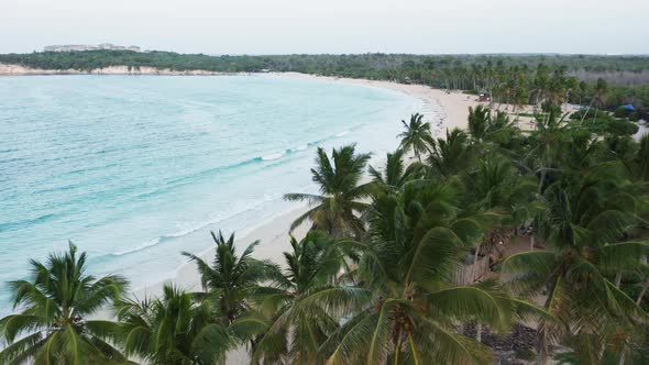 Mesmerizing Ocean Waters Washing White Sandy Beach As Seen From Above