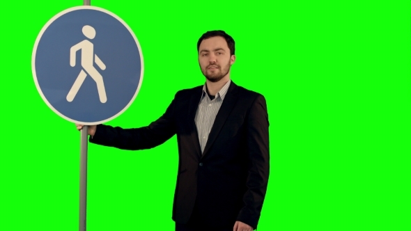 Man Cross Walk Sign On a Green Screen