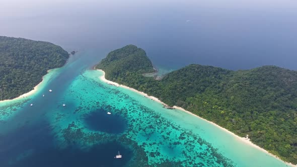 Flying Up Over Tropical Island in Thailand