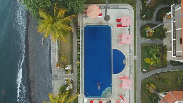 Girl Is Swimming in the Pool.