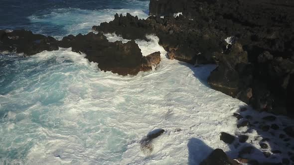 Aerial Of Waves Crashing In To The Shore