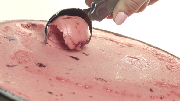 Scooping Strawberry Flavoured Ice Cream 