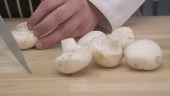 Chef Slicing Mushrooms
