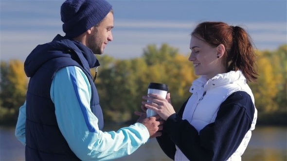 Young Athlete With Morning Coffee For Girlfriend