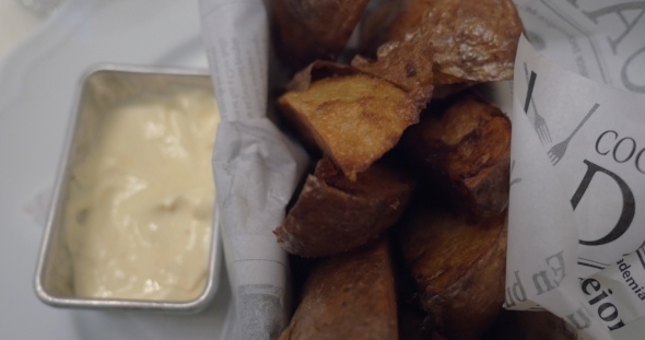 Eating Baked Potatoes With Cream Sauce