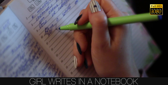 Girl Writes In A Notebook 4