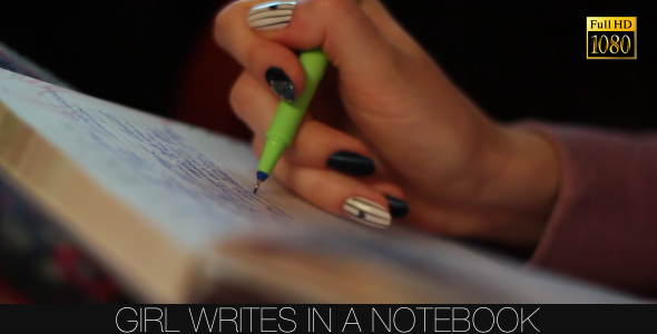 Girl Writes In A Notebook 6
