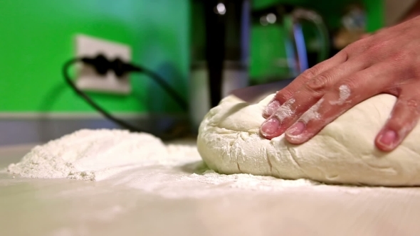 Woman Kneading Dough