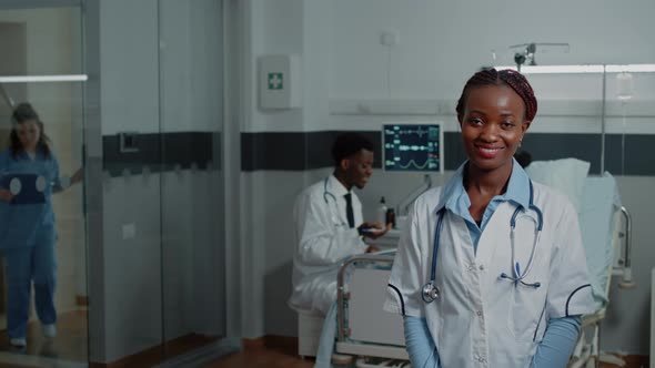 Portrait of African American Medic with White Coat