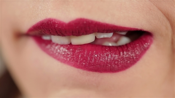 Sexy Woman Lips With Red Makeup And Gloss