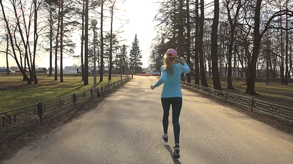 Girl Running On Park