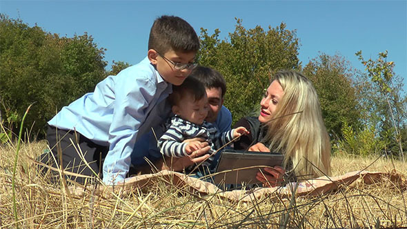 Smiling Couple Together With Children