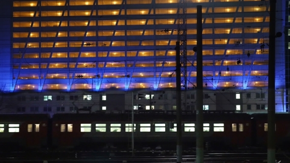 Passenger Train In City At Night