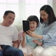 Asian family relaxing on the sofa in the living room, family relationship - VideoHive Item for Sale