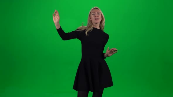 Woman Dancing in Black Dress. Green Screen