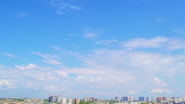 Clouds in the Blue Sky Over the City