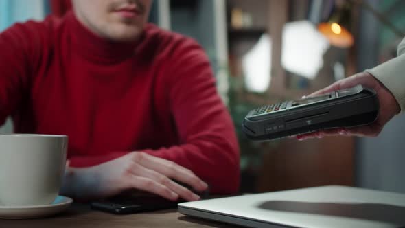 Man is Using Contactless Payment to Observe Safety Protection