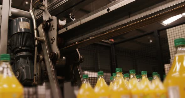 Machine separating juice bottles