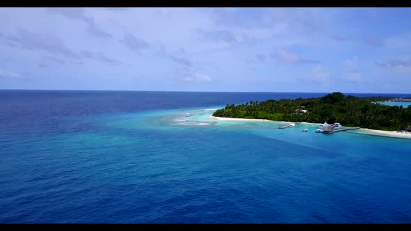 Aerial drone texture of tropical shore beach holiday by blue ocean and white sand background of a da