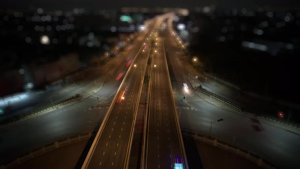 Stunning Aerial night view drone shot above roundabout