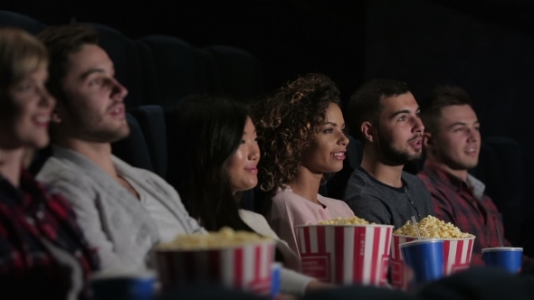Friends In Cinema Watching a Movie