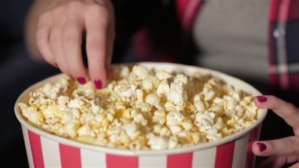 Bucket Of Popcorn And a Hand Of The Girl