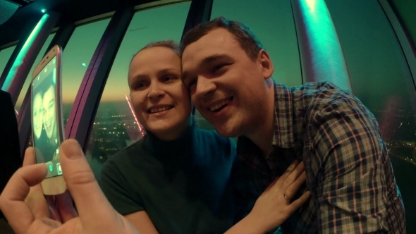 Loving Couple Making Selfie With Cell At Sky Deck