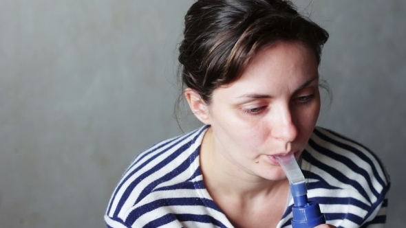 Woman Wears a Mask For Inhalation, And Conducts