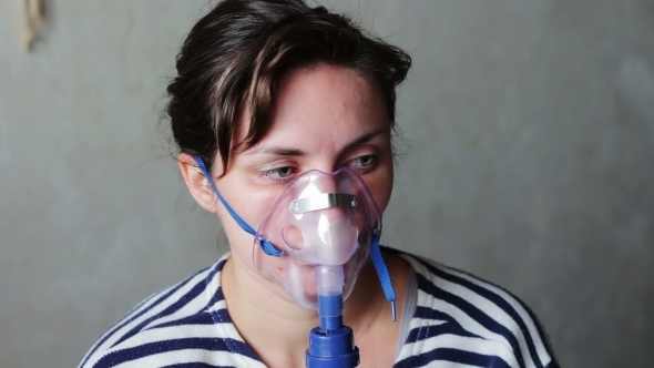 Woman Wears a Mask For Inhalation, And Conducts