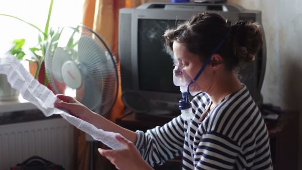 Woman Wears a Mask For Inhalation