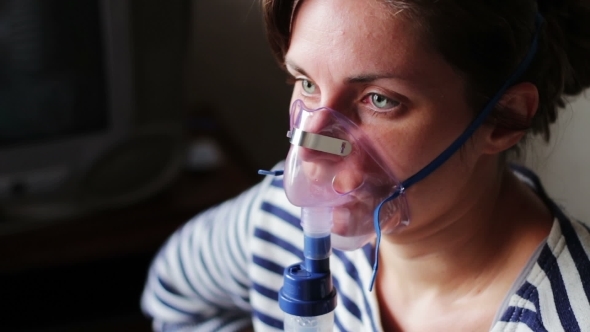 Woman Wears a Mask For Inhalation, And Conducts