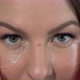 Young Woman Takes Care of Skin of Face - VideoHive Item for Sale
